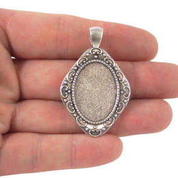 BAZA WISIORKA DO KABOSZONA OWALNA 18x25 mm.